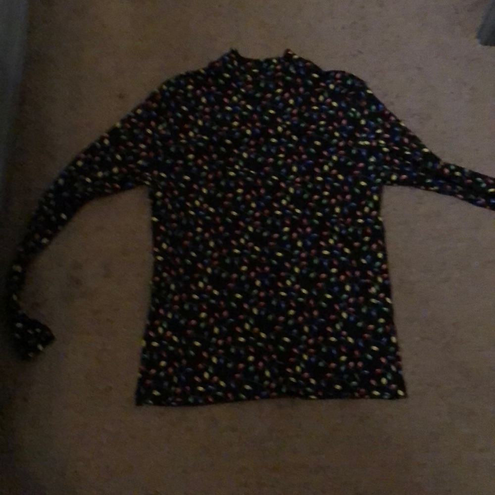 A Christmas shirt with no lights everywhere on it